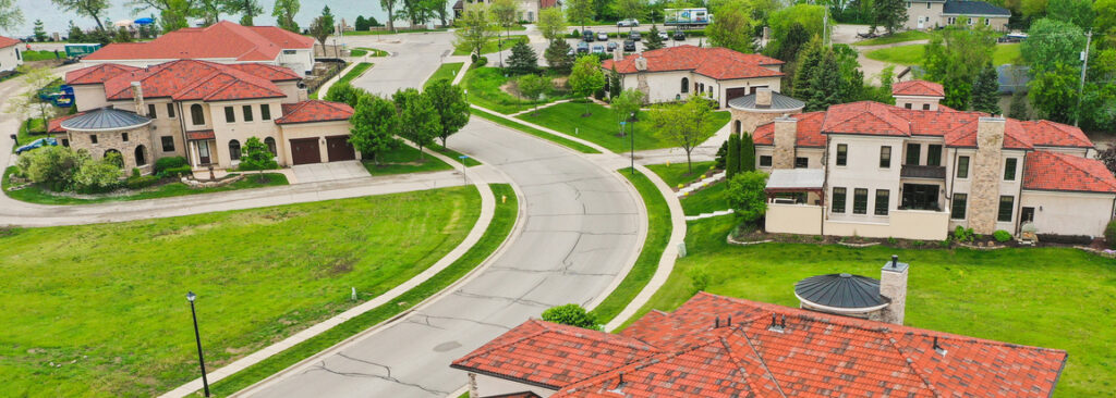 Aerial view of Florida neighborhood of homes with Red Roofing system installed