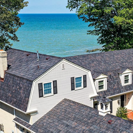 Aerial view of a large home by the ocean in Florida